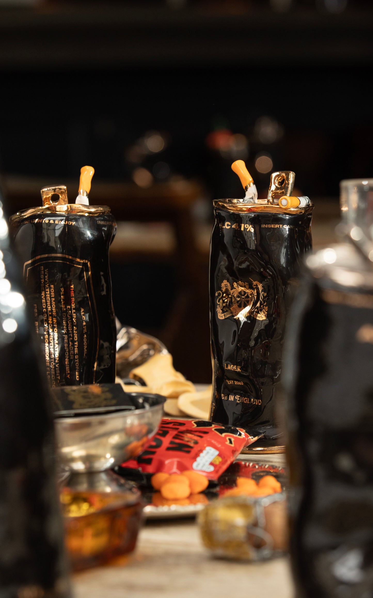 COUPLE OF CIGARETTES BEER CAN