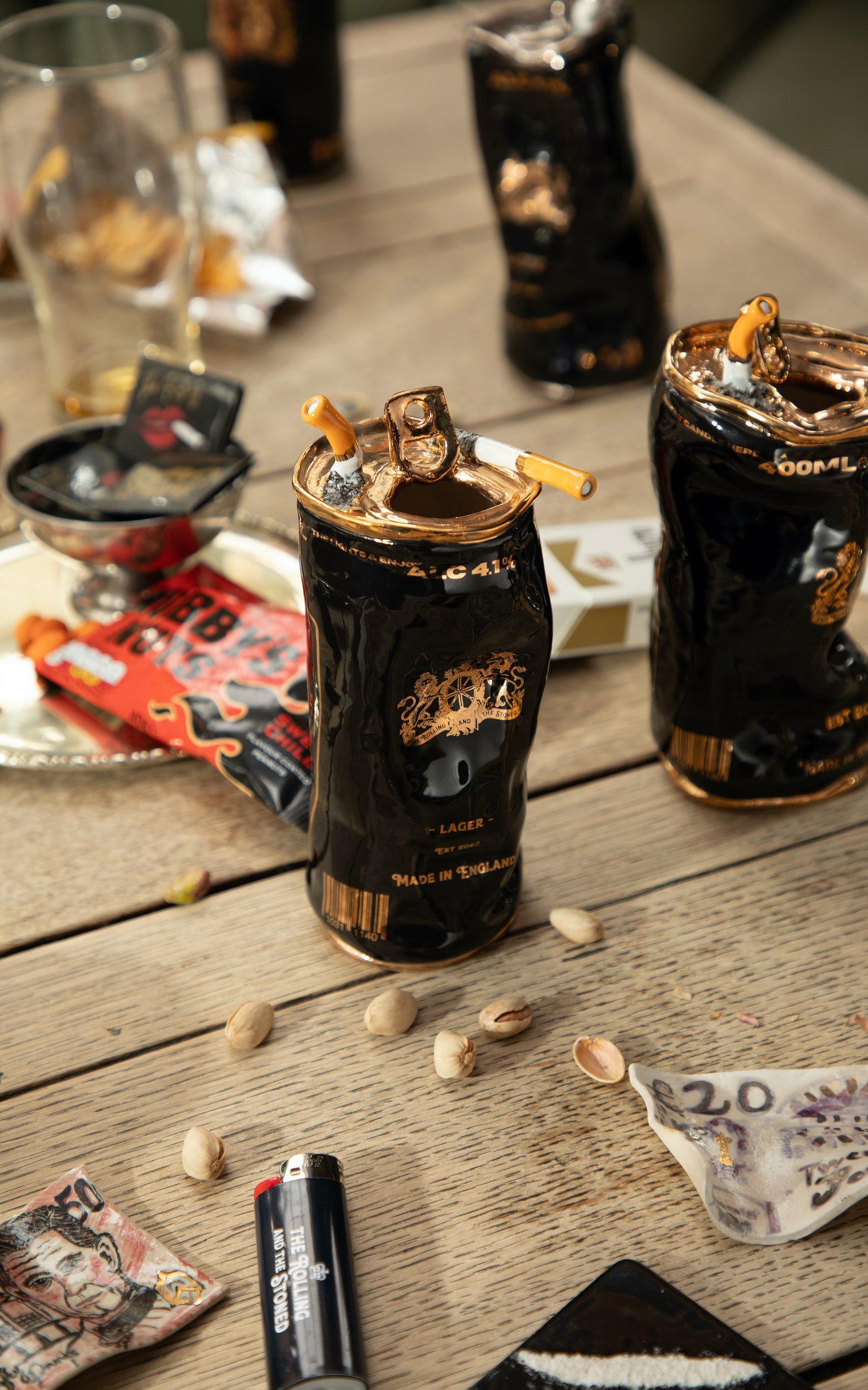 COUPLE OF CIGARETTES BEER CAN